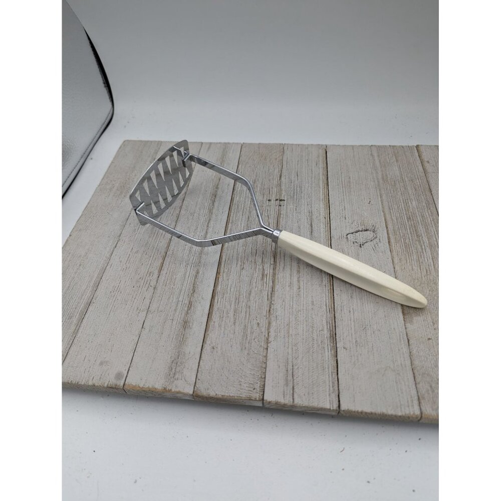 Vintage Androck #1 Chrome Plate Potato Masher White Handle  9 3/4"